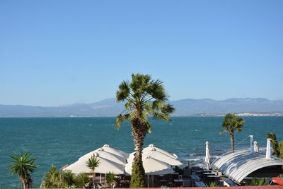Scenic view of sea against clear blue sky