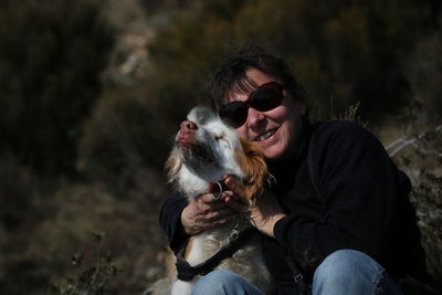 Smiling woman with dog