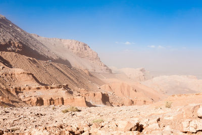 Scenic view of desert against sky