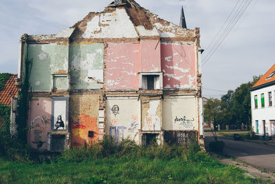 Abandoned building against sky