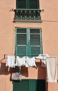 Clothes drying against building