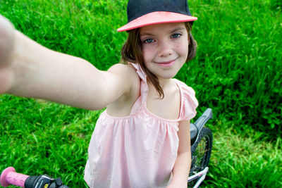 Girl has damaged bicycle wheel and making repairs