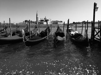 Boats moored in canal