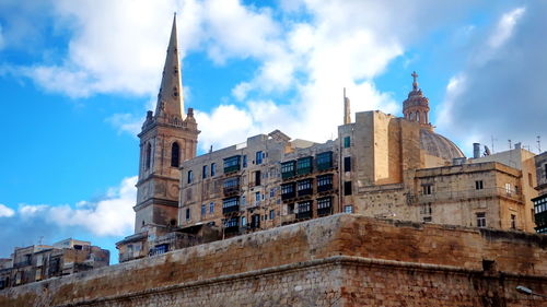 Low angle view of buildings against sky