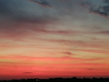 Low angle view of dramatic sky during sunset