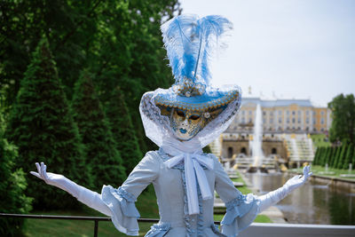 Woman in carnival dress mask