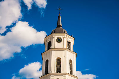 Low angle view of clock tower against sky