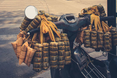 Food hanging on scooter at street