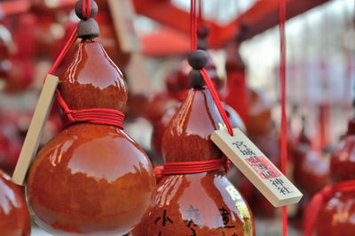 Close-up of decoration hanging at market stall