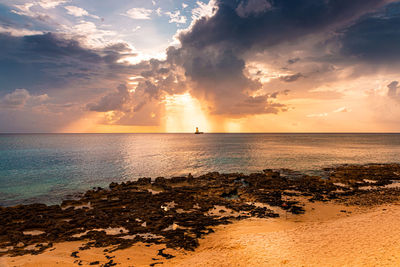 Scenic view of sea against sky during sunset