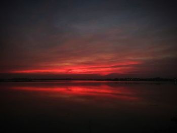 Scenic view of sea against romantic sky at sunset
