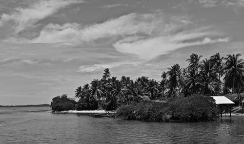 Scenic view of sea against cloudy sky