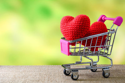 Close-up of red toy in basket