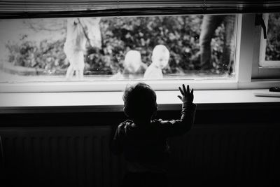 Boy in window