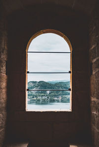 Sea seen through arch window