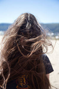 Rear view of woman looking at sea