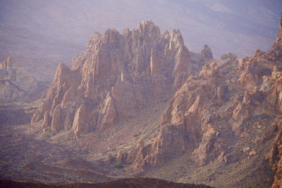 Panoramic view of landscape with mountain range in background