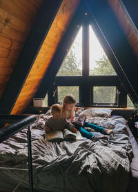 People relaxing on bed