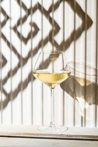 Close-up of wineglass on table