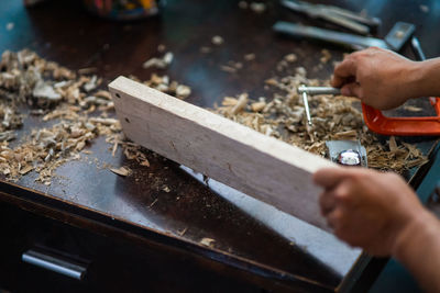 Person working on wood