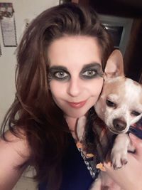 Portrait of mature woman at home