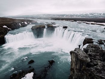 Scenic view of waterfall during winter