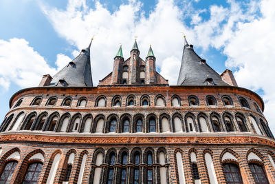 Low angle view of historical building against sky