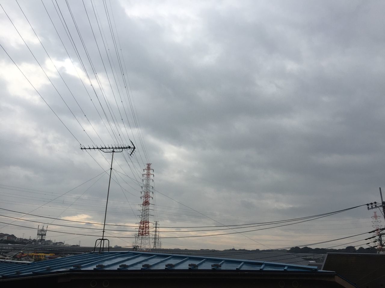 connection, electricity pylon, electricity, power supply, power line, fuel and power generation, technology, low angle view, sky, cable, cloud - sky, tall - high, cloud, electricity tower, power cable, day, cloudy, outdoors, iron - metal, development, no people, atmosphere, complexity, clouds, high section