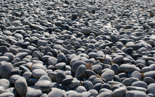 Full frame shot of pebbles on beach
