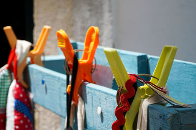 Close-up of multi colored chairs on table