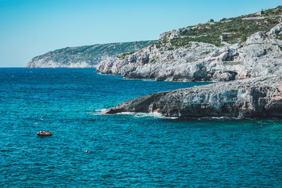 Scenic view of sea against clear sky