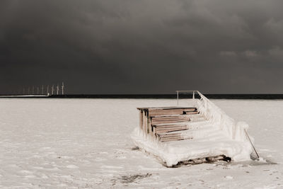 Scenic view of sea against sky during winter