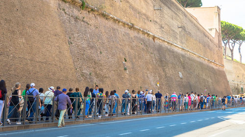 Group of people walking on road