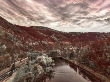 Scenic view of tree mountains against sky