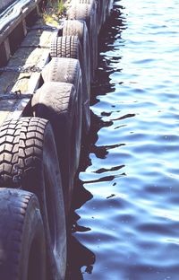 Close-up of tire in water