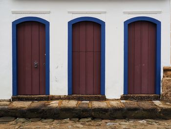 Closed blue door of building