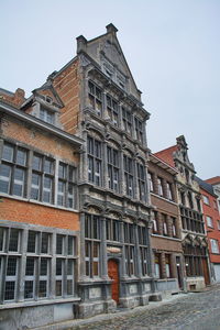Low angle view of old building against sky
