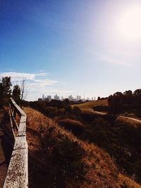 Scenic view of landscape against blue sky