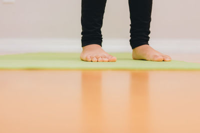 Low section of person standing on floor