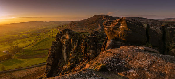 Scenic view of mountains against sky during sunset