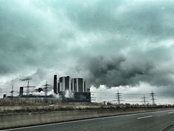 View of road against cloudy sky