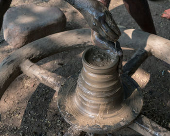 High angle view of hands working