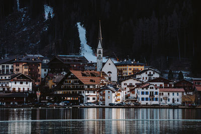 Buildings in city at night