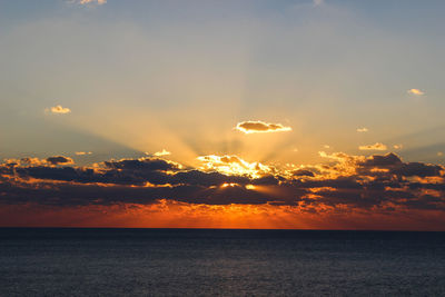 Scenic view of sea at sunset