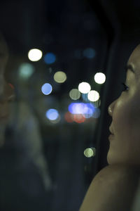 Defocused image of illuminated lights at night