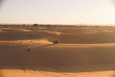 Scenic view of desert against sky