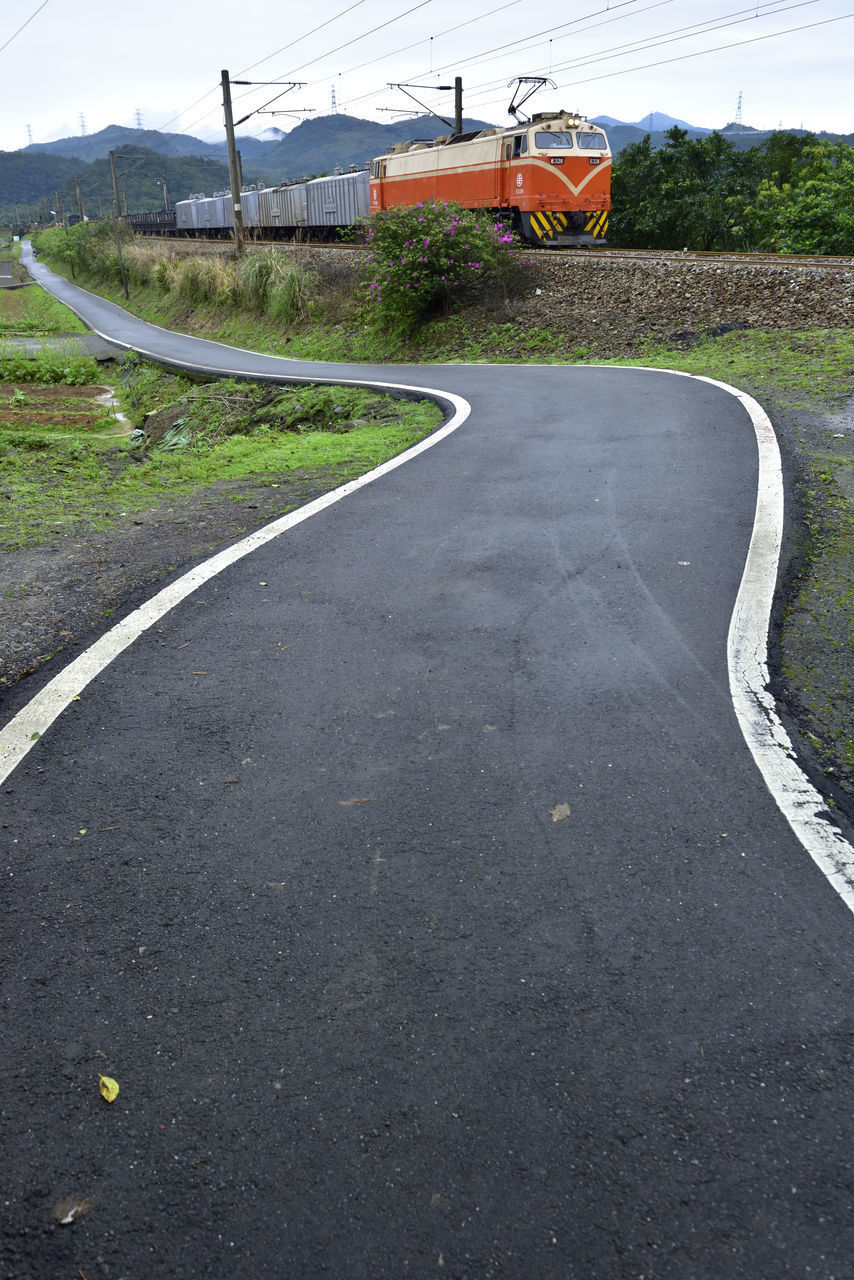 EMPTY ROAD AGAINST SKY