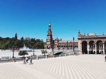 View of historical building against clear blue sky