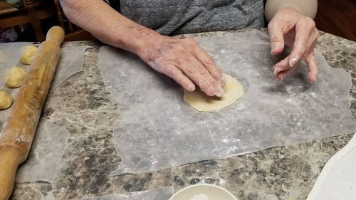 High angle view of man preparing food