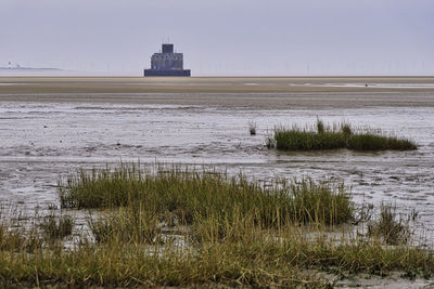 Scenic view of sea against clear sky